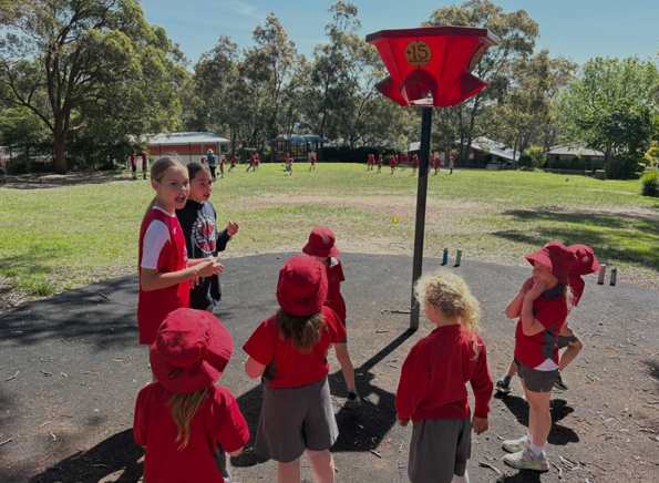 Photo of students playing in the playground